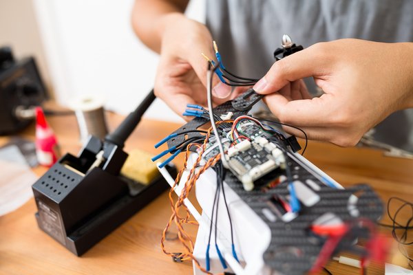 What legal steps should UK businesses take to ensure compliance when using drones for commercial purposes?